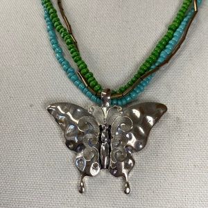 Large shiny silvertone butterfly pendant necklace
